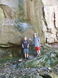 Luke and Clay under the waterfall